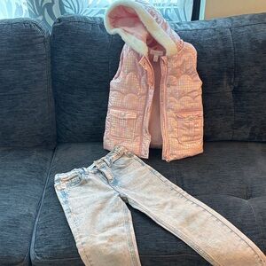 Pink Quilted Vest with Fur Hood and Light Blue Jeans